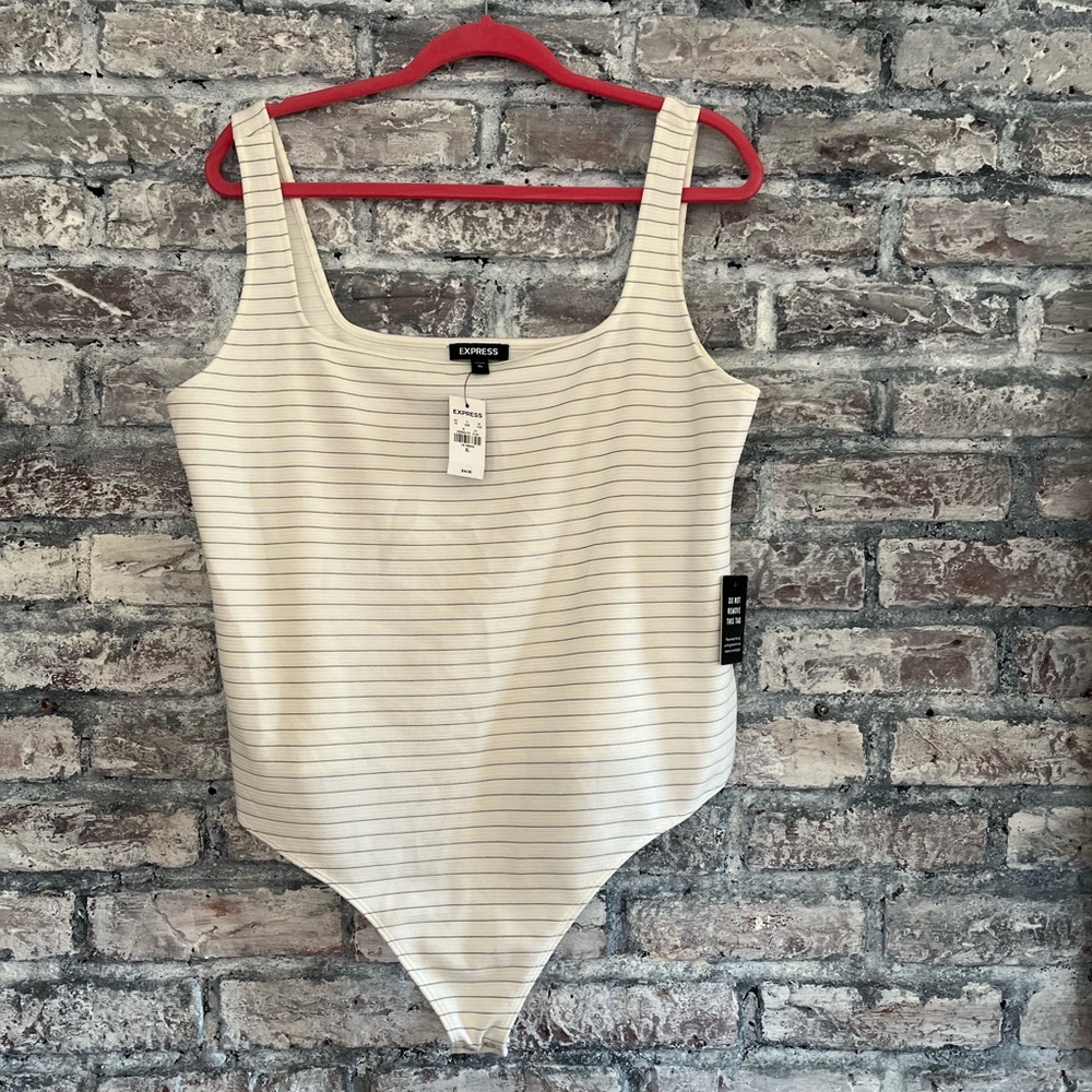 Express NWT cream with thin black stripe body suit. Waited to long to return